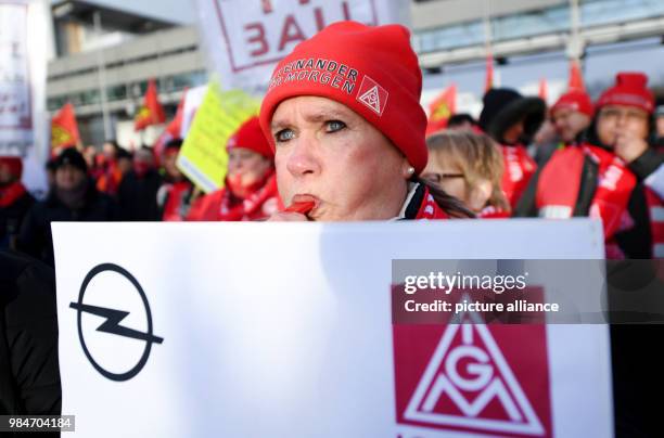 An Opel employee following a rally in front of the Adam Opel House in Ruesselsheim, Germany, 17 January 2018. The IG Metall labor union summoned...