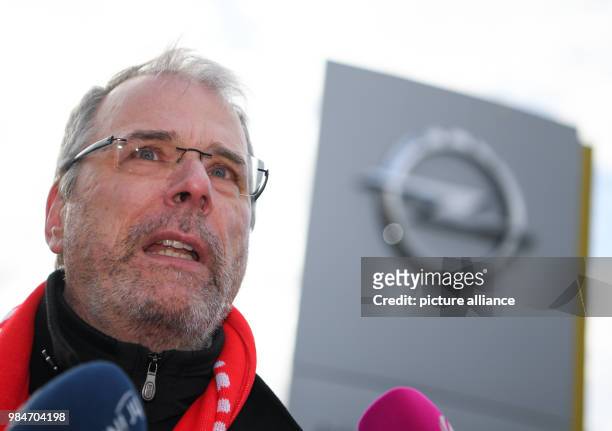 The chairman of Opel's general works council, Wolfgang Schaefer-Klug, giving interviews after a rally in front of the Adam Opel House in...