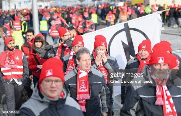Opel employees walking back to their jobs after a rally in front of the Adam Opel House in Ruesselsheim, Germany, 17 January 2018. The IG Metall...