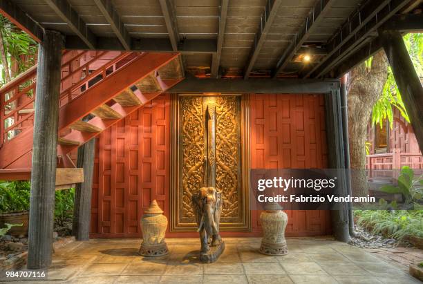 bangkok - jim thompson house - statue - fabrizio villa stock pictures, royalty-free photos & images