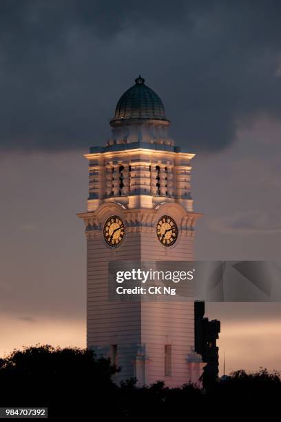 victoria concert hall clock tower at sunset - victoria tower stock pictures, royalty-free photos & images