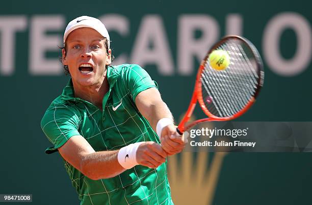 Tomas Berdych of Czech Republic plays a backhand in his match against Fernando Verdasco of Spain during day four of the ATP Masters Series at the...