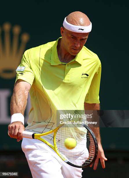 Ivan Ljubicic of Croatia plays a backhand in his match against David Ferrer of Spain during day four of the ATP Masters Series at the Monte Carlo...