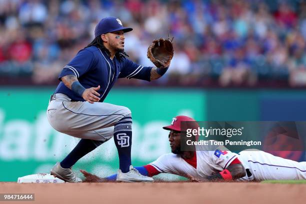 Jurickson Profar of the Texas Rangers beats the throw to steal second base against Freddy Galvis of the San Diego Padres in the bottom of the second...