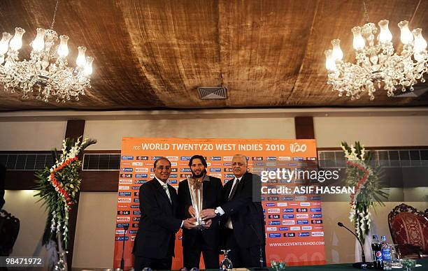 International Cricket Council Chief Executive Haroon Lorgat Pakistan cricket team captain Shahid Afridi and Pakistan Cricket Board chairmen Ijaz Butt...