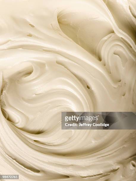 vanilla frosting, close-up - vanilla ice cream stock pictures, royalty-free photos & images