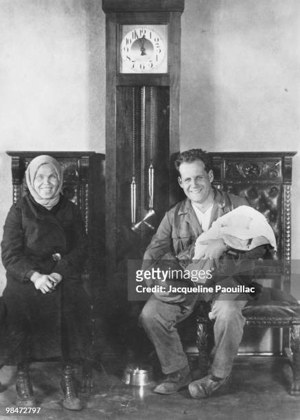 Russian film director Sergei Mikjailovich Eisenstein holding the child of actress Marfa Lapkina , 1929. Lapkina starred in Eisenstein's film 'Staroye...