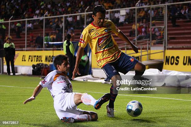 Morelia's player Jaime Duran vies for the ball with Danilo Veron of Jaguares during their match as part of the 2010 Bicentenary Tournament in the...