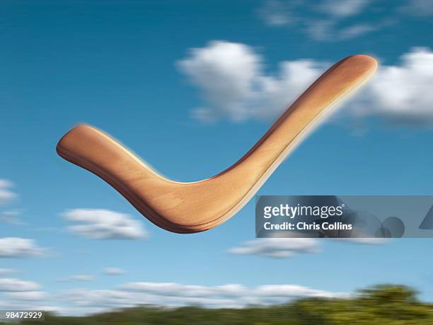 flying boomerrang - boomerang stock pictures, royalty-free photos & images