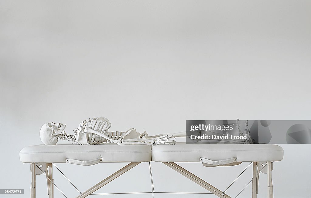 Skeleton on massage table