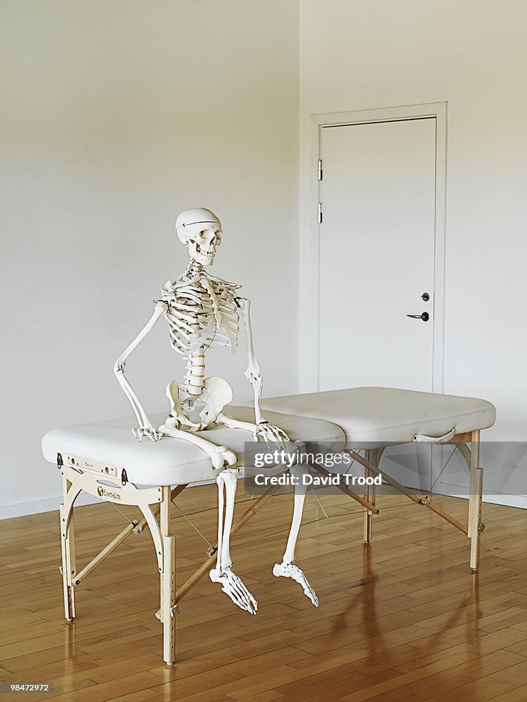 Human skeleton waiting at a clinic.  