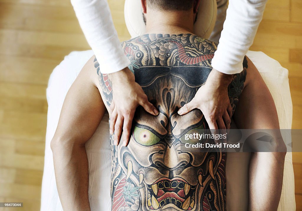 Massaging a tatoo