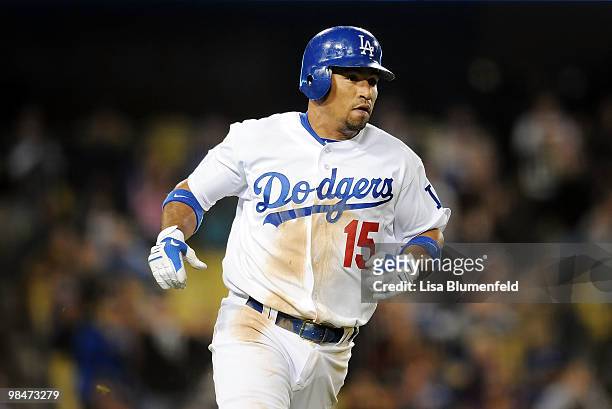 Rafael Furcal of the Los Angeles Dodgers runs to first base after hitting a single in the 10th inning against the Arizona Diamondbacks at Dodger...