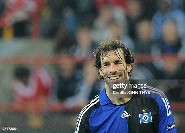 Hamburg's Dutch forward Ruud Van Nistelrooy reacts during the UEFA Europa League 1st leg quarter-final football match Standard Liege vs Hamburg SV at...