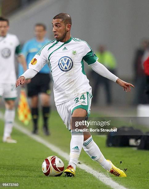 Ashkan Dejagah of Wolfsburg runs with the ball during the UEFA Europa League quarter final second leg match between VfL Wolfsburg and Fulham FC at...