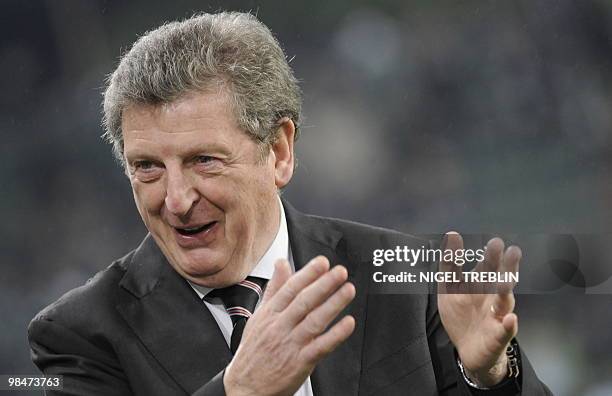 Fulham's coach Roy Hodgson gestures during the UEFA Europa League second leg quarter-final football match VFL Wolfsburg vs Fulham FC in the northern...