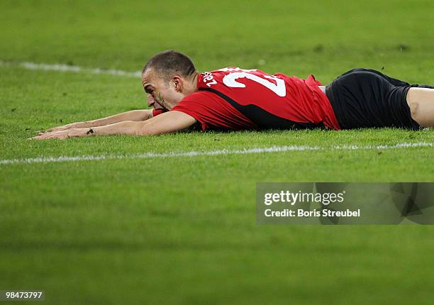 Robert Zamora of Fulham falls to the ground during the UEFA Europa League quarter final second leg match between VfL Wolfsburg and Fulham FC at...