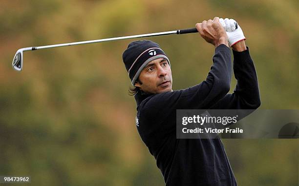 Jyoti Randhawa of India prepares to tee off on the 17th hole during the Round One of the Volvo China Open on April 15, 2010 in Suzhou, China.