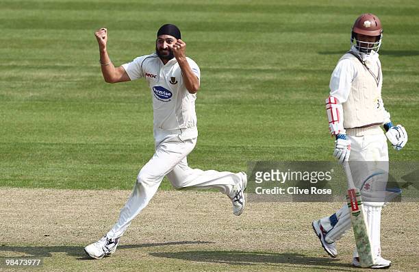Monty Panesar of Sussex celebrates the wicket of Steve Davies of Surrey during the LV County Championship Division Two match between Sussex and...