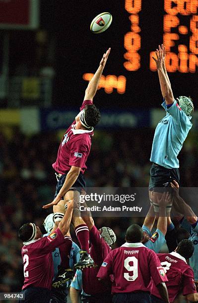 John Eales of the Reds and Jono Wests of the Waratahs contest in a line-out during the 2001 Super 12 Rugby Series played between the New South Wales...