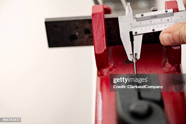 professional goldsmith at work. - vernier calliper stock pictures, royalty-free photos & images