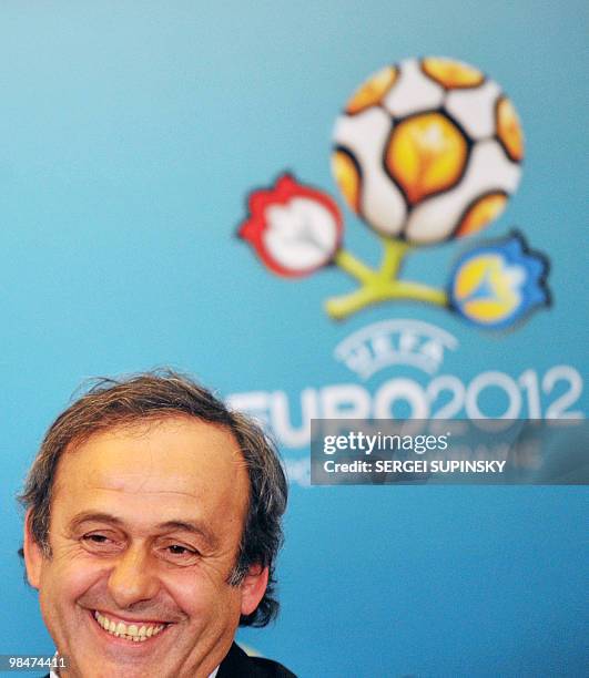 President French Michel Platini smiles as he answers a question during his press-conference after talks with Ukraine's President Viktor Yanukovich in...