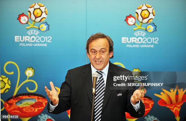 President French Michel Platini gestures as he unswers a question during his press-conference after talks with Ukraine's President Viktor Yanukovich...