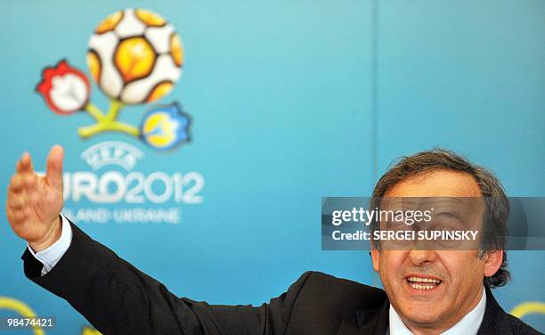 President French Michel Platini gestures during his press-conference after talks with Ukraine's President Viktor Yanukovich in Kiev on April 8, 2010....