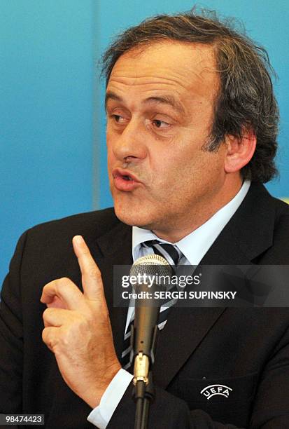 President French Michel Platini gwstures during his press-conference after talks with Ukraine's President Viktor Yanukovich in Kiev on April 8, 2010....