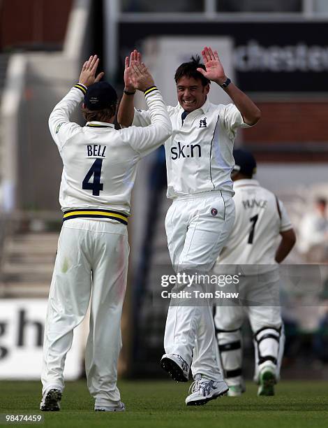 Neil Carter of Warwickshire celebrates taking the wicket of Ashwell Prince of Lancashire during the LV County Championship match between Lancashire...