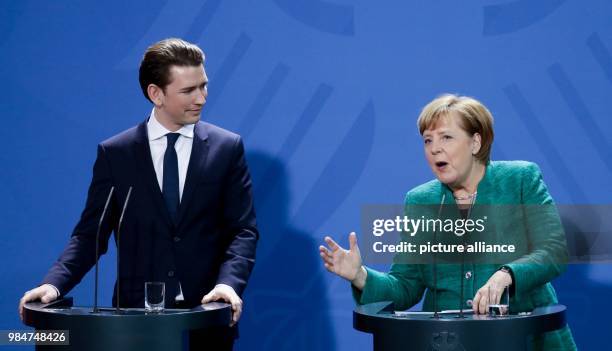 Dpatop - German Chancellor Angela Merkel speaks during a press conference with Austrian Chancellor Sebastian Kurz, after their meeting, at the German...