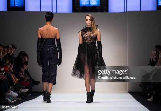 Models walk the runway during the fashion show of designer Irene Luft at the Mercedes-Benz Fashion Week at the E-Werk in Berlin, Germany, 17 January...