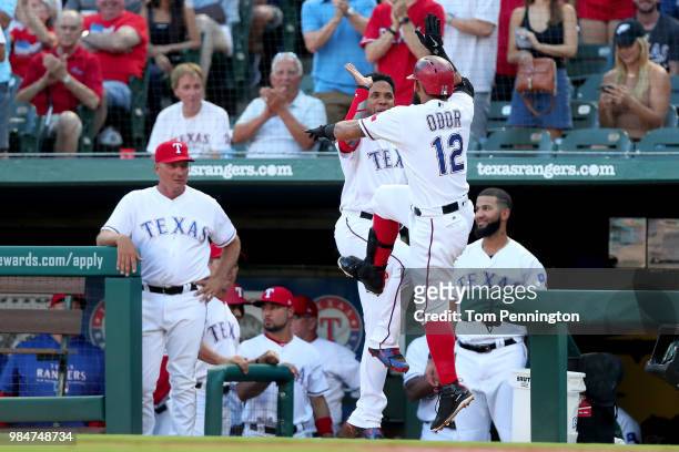 Rougned Odor of the Texas Rangers celebrates with Elvis Andrus of the Texas Rangers after hitting a solo home run against the San Diego Padres in the...
