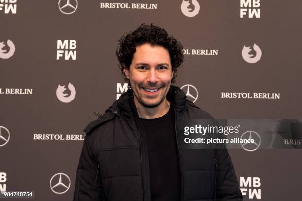 The make up atsist Boris Entrup attends the show of designer Irene Luft during the Mercedes-Benz Fashion Week at the E-Werk in Berlin, Germany, 17...