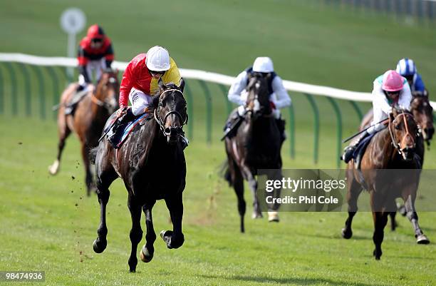 Elusive Pimpernel ridden by Ryan Moore on the left with a white hat wins the Racing Post breezeupbonus.com Craven Stakes on April 15, 2010 in...