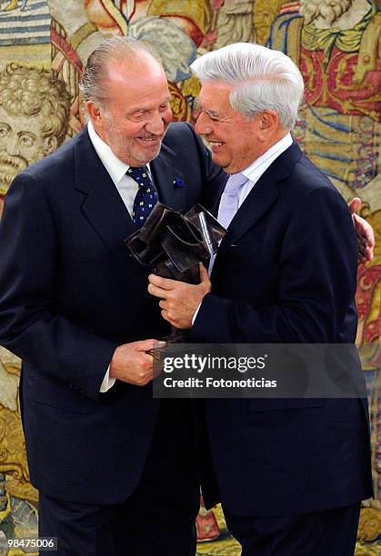 King Juan Carlos of Spain delivers 'Don Quijote De La Mancha' International Award to writer Mario Vargas Llosa, at Zarzuela Palace on April 15, 2010...