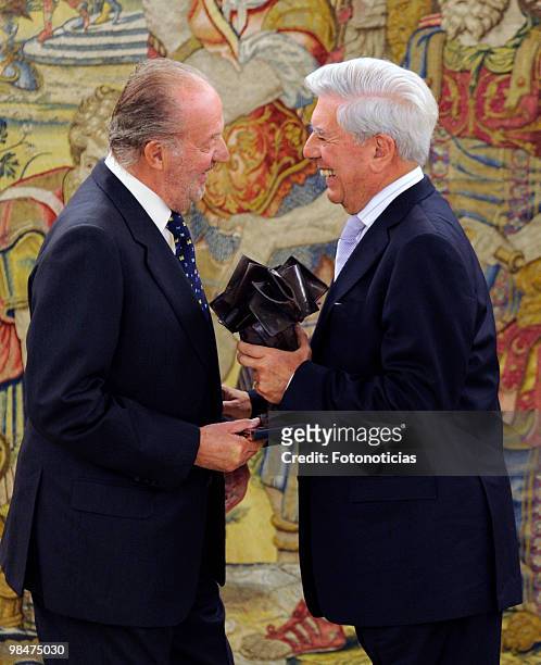 King Juan Carlos of Spain delivers 'Don Quijote De La Mancha' International Award to writer Mario Vargas Llosa, at Zarzuela Palace on April 15, 2010...