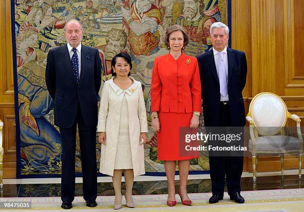 King Juan Carlos of Spain, President of Philippines Gloria Macapagal Arroyo, Queen Sofia of Spain and writer Mario Vargas Llosa pose for...