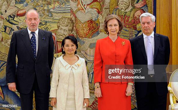 King Juan Carlos of Spain, President of Philippines Gloria Macapagal Arroyo, Queen Sofia of Spain and writer Mario Vargas Llosa pose for...