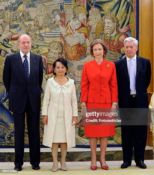 King Juan Carlos of Spain, President of Philippines Gloria Macapagal Arroyo, Queen Sofia of Spain and writer Mario Vargas Llosa pose for...