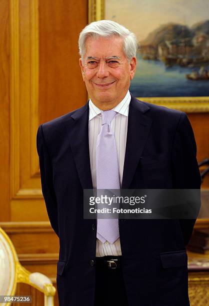 Writer Mario Vargas Llosa poses for photographers during 'Don Quijote De La Mancha' International Awards ceremony, held at Zarzuela Palace on April...