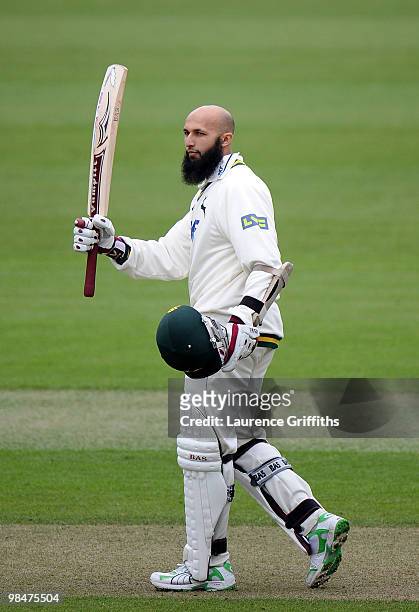 Hashim Amla of Nottinghamshire celebrates his century during the LV County Championship Match between Nottinghamshire and Kent at Trent Bridge on...