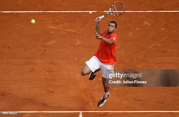 Jo-Wilfried Tsonga of France goes to play a smash in his match against Juan Carlos Ferrero of Spain during day four of the ATP Masters Series at the...