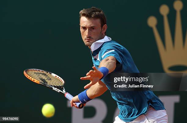 Juan Carlos Ferrero of Spain in action against Jo-Wilfried Tsonga of France during day four of the ATP Masters Series at the Monte Carlo Country Club...