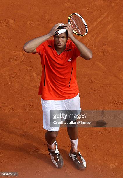 Jo-Wilfried Tsonga of France reacts in his match against Juan Carlos Ferrero of Spain during day four of the ATP Masters Series at the Monte Carlo...