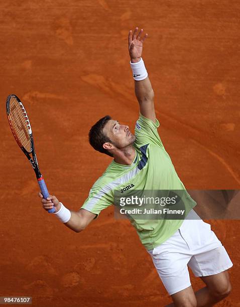 Juan Carlos Ferrero of Spain in action against Jo-Wilfried Tsonga of France during day four of the ATP Masters Series at the Monte Carlo Country Club...
