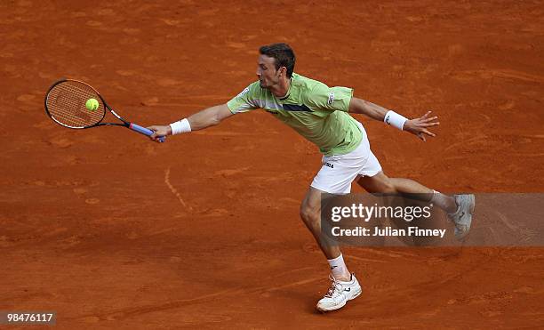 Juan Carlos Ferrero of Spain in action against Jo-Wilfried Tsonga of France during day four of the ATP Masters Series at the Monte Carlo Country Club...