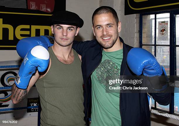 Chelsea footballer Joe Cole steps into the boxing ring with Kevin Mitchell during a photocall with his friend and World Title Challenger at TKO...