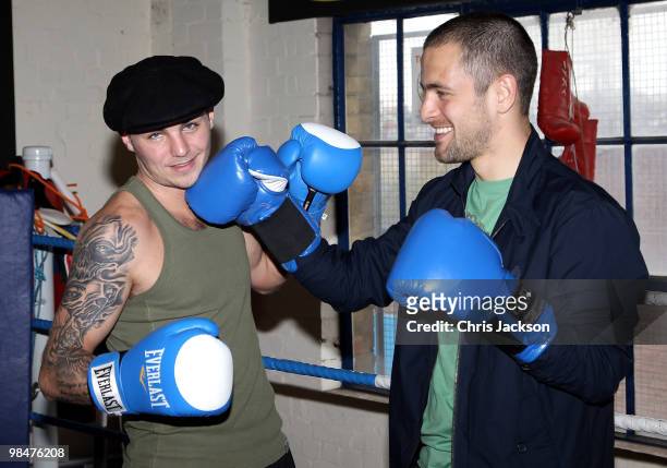 Chelsea footballer Joe Cole steps into the boxing ring with Kevin Mitchell during a photocall with his friend and World Title Challenger at TKO...