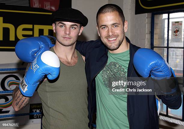 Chelsea footballer Joe Cole steps into the boxing ring with Kevin Mitchell during a photocall with his friend and World Title Challenger at TKO...